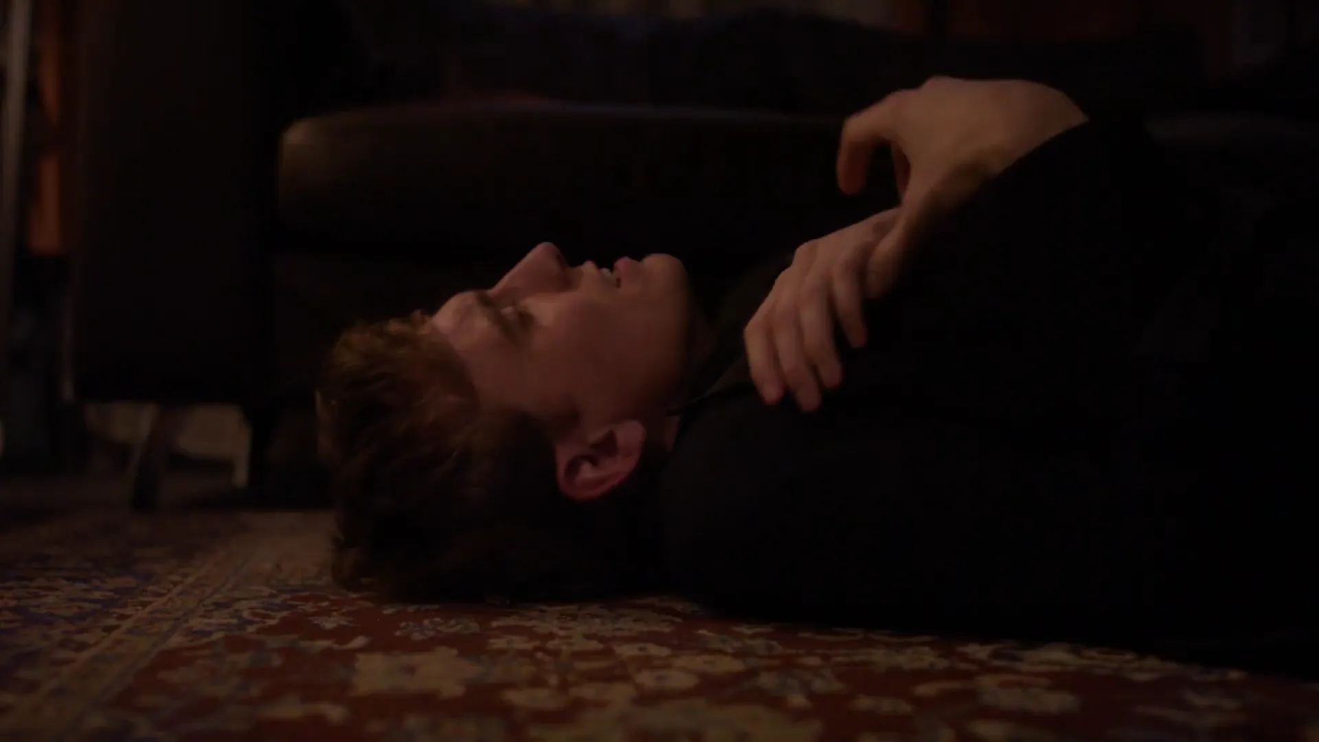 A man lying on the floor